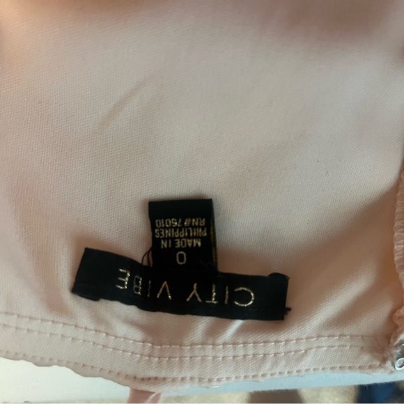 Size 0 super cute light pink mini dress. Halter top, fits according to size - Picture 3 of 3